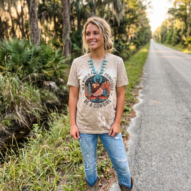 Be a Cowgirl Graphic Tee – In a World Full of Princes Shirt